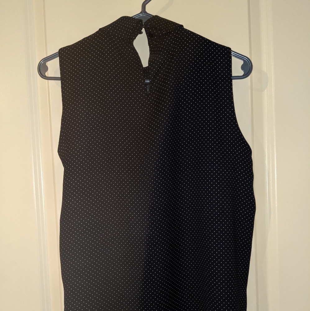 Blue and white polka dot blouse